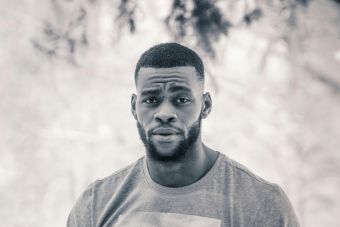 Grayscale Photo Of Man In Nike Crew Neck T-shirt