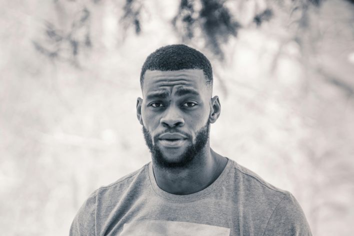 Grayscale Photo Of Man In Nike Crew Neck T-shirt