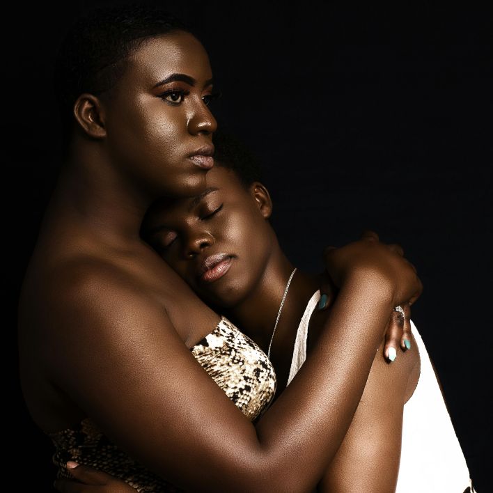 Tender embrace between two women, symbolizing affection and love.